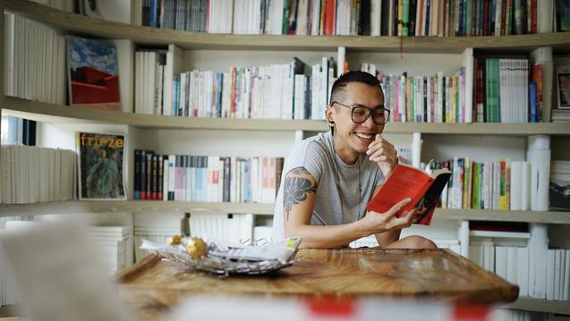 student reading in library