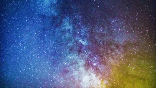 blue, purple, and yellow cosmic sky photo