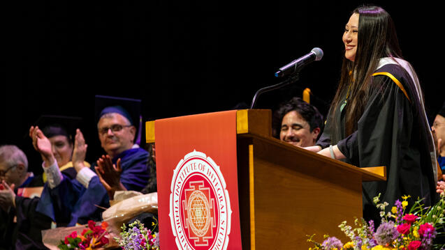 Integral Counseling Psychology graduate Marissa Huang delivers a student reflection at CIIS' 57th Commencement Ceremony.