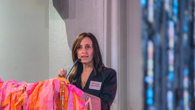 Human Sexuality Studies Chair Michelle Marzullo speaking at an event.