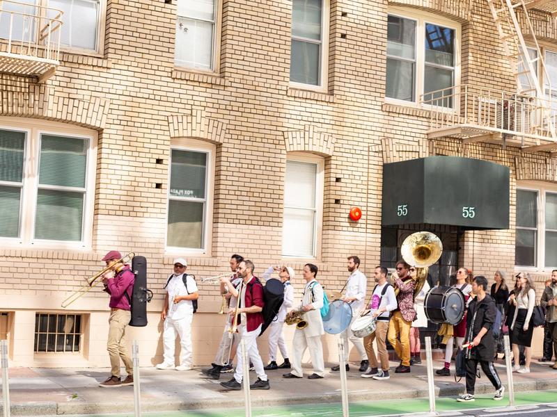 Band playing at CIIS' Commencement near campus